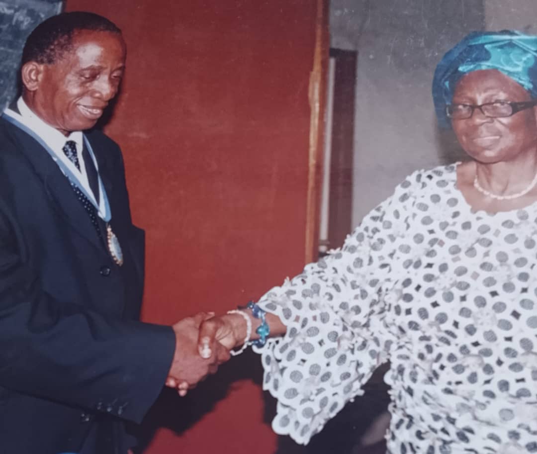 Handing over by Chief Mrs. Balogun to Prof. E.E. Chibundu in 2008
